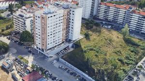 an overhead view of a large white building at Be Local - Apartment with 3 bedroom near Oriente Station in Lisbon in Lisbon