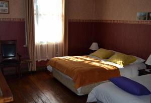Postel nebo postele na pokoji v ubytování B&B La Nona