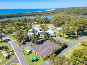 an aerial view of a park with a tennis court at Valla Beach Holiday Park in Valla Beach