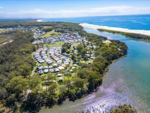 an aerial view of a park next to the ocean at Valla Beach Holiday Park in Valla Beach