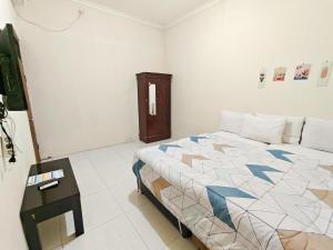 泗水Homey Guesthouse near Sby Zoo Syariah的相册照片