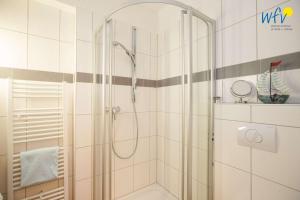 Ένα μπάνιο στο Bungalow Süddüne