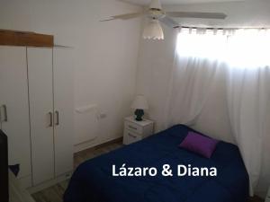 En eller flere senge i et værelse på Lázaro & Diana