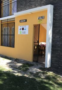 an open door to a patio with a table at Lázaro & Diana in San Clemente del Tuyú