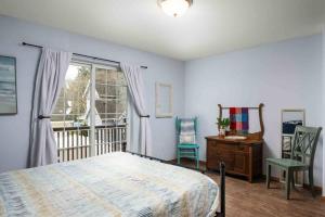 Voodi või voodid majutusasutuse Beach Bungalow toas