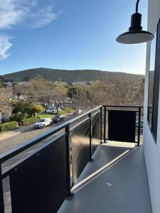 a balcony with a view of a parking lot at Urban SLO Living- 1 mile from downtown in San Luis Obispo