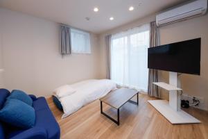 A bed or beds in a room at La Terrasse Higashikomagata - Vacation STAY 18114v