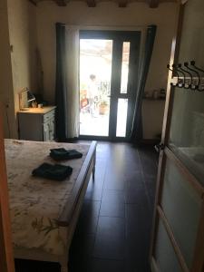 Postel nebo postele na pokoji v ubytování BelCiano (ancien Toit Vert)