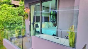 Jardín al aire libre en B407-High Floor Pool View 1 Br At Ao Nang Beach