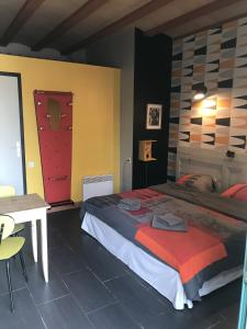 Postel nebo postele na pokoji v ubytování BelCiano (ancien Toit Vert)