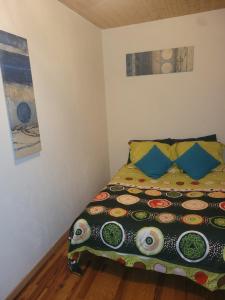 Un pat sau paturi într-o cameră la Superbe appartement avec parking +8 fotografii