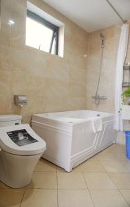 A bathroom at Pronics Hanoi Service Apartment 1