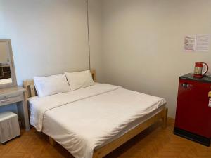 Postel nebo postele na pokoji v ubytování Sakura House