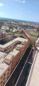an overhead view of a building under construction at غرفه بشقه بأطلاله على البحر in ‘Izbat al Qaşr