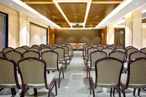 a row of chairs in a conference room at Lance 21 - Ashok Nagar in Chennai +20 photos