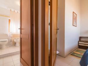 Ένα μπάνιο στο Holiday Home Stintino with Stunning Sea View +33 φωτογραφίες
