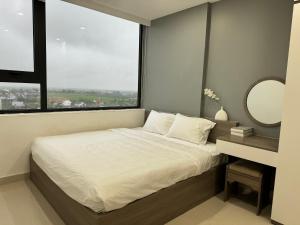 מיטה או מיטות בחדר ב-Noric homestay