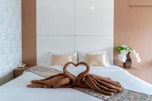 Letto o letti in una camera di The Infinity Suite Chiangrai
