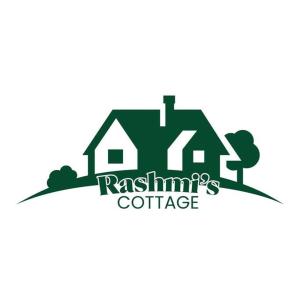 a logo for a real estate coffee company at Rashmi Cottage in Dagshai