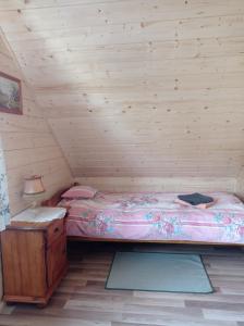 Letto o letti in una camera di Agroturystyka Przy Siole Budy