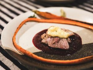 a plate of food with a dessert on a table at La Terra Resort in Shiojiri +163 photos