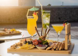 a tray of food and drinks on a table at Grand Regal Hotel Davao in Davao City