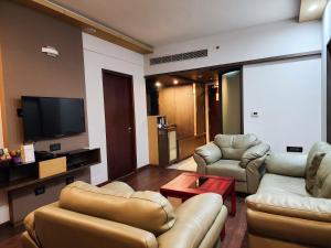 Dimora Hotels And Resorts的电视和/或娱乐中心