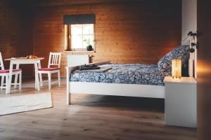 Ένα ή περισσότερα κρεβάτια σε δωμάτιο στο Kinsau Rooms