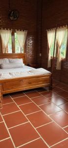 Postel nebo postele na pokoji v ubytování Homestay Dream hill
