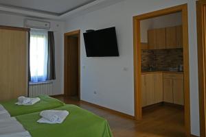 Postel nebo postele na pokoji v ubytování Egreta By Hoxton