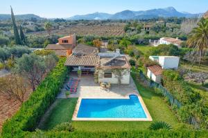 an aerial view of a house with a swimming pool at Villa Vinya Maria by Villa Plus in Pollença