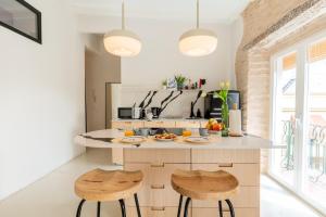 Kuchyňa alebo kuchynka v ubytovaní AD3B Bright 3Br and 2Bath apartment Downtown Sevilla