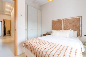 Posteľ alebo postele v izbe v ubytovaní AD3B Bright 3Br and 2Bath apartment Downtown Sevilla