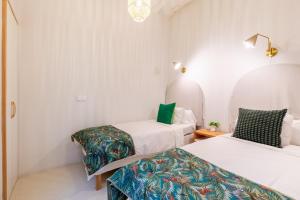 Posteľ alebo postele v izbe v ubytovaní AD3B Bright 3Br and 2Bath apartment Downtown Sevilla