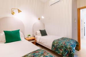 Posteľ alebo postele v izbe v ubytovaní AD3B Bright 3Br and 2Bath apartment Downtown Sevilla