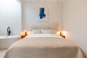 Posteľ alebo postele v izbe v ubytovaní AD3B Bright 3Br and 2Bath apartment Downtown Sevilla