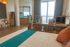 Postel nebo postele na pokoji v ubytování Hanoi Shouten - Staycation