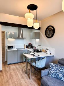 Kuchnia lub aneks kuchenny w obiekcie Le Garden & SPA