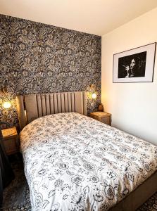 Łóżko lub łóżka w pokoju w obiekcie Le Garden & SPA