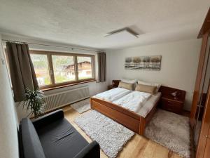 Postel nebo postele na pokoji v ubytování Apartment Bergblick