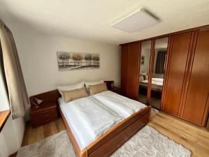 Postel nebo postele na pokoji v ubytování Apartment Bergblick