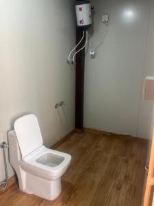 Koupelna v ubytování Reys Cafe and Boutique Cottage - A Jungle Stay