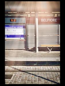 a train station with a train platform with a train station at Celeste's House in Florence