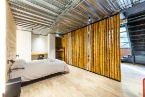 Postel nebo postele na pokoji v ubytování ART LOFTS Valencia by Benisur