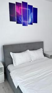 Postel nebo postele na pokoji v ubytování Summer Vibe - Apartament la curte