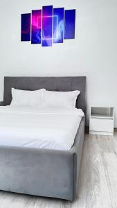 Postel nebo postele na pokoji v ubytování Summer Vibe - Apartament la curte