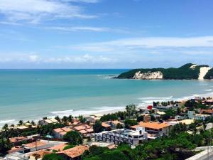 a view of the beach and the ocean at Ahead Apartment in Natal