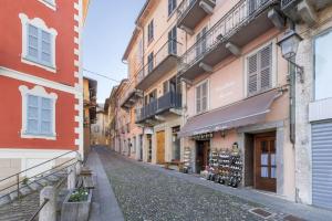 an empty street in a city with buildings at Casa Elena Lago - Maggiore Estate by Ginin in Cannobio
