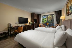 TV a/nebo společenská místnost v ubytování San Palace Hotel & Spa