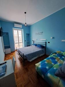 Postel nebo postele na pokoji v ubytování La Bertina
